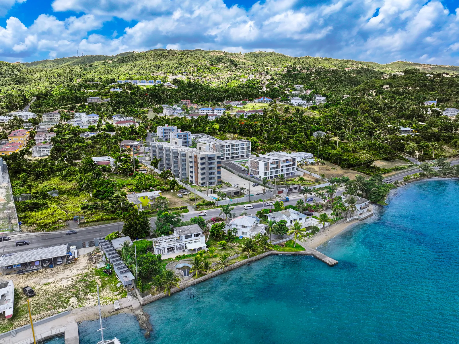 Aerial view of Reading, St. James, with new apartment buildings along the waterfront and hills behind